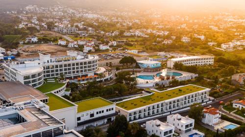 an aerial view of a city with buildings at Chamada Prestige Hotel and Casino in Kyrenia