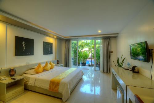 Voodi või voodid majutusasutuse Angkor Sweet Night Hotel toas