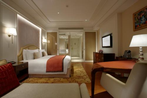 Cama o camas de una habitación en The Okura Prestige Taipei