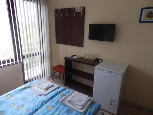 Postel nebo postele na pokoji v ubytování Mix Hotel