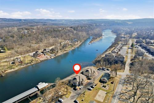 an aerial view of a river with a red arrow at Waterfront Condo near Marina in Branson