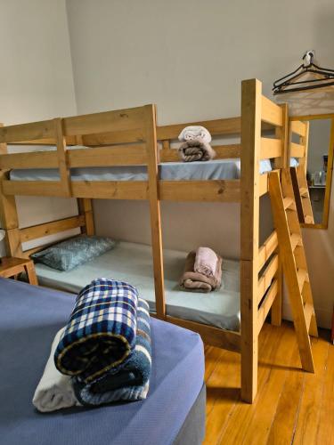 a room with two bunk beds and a bed at Pousada Seu Jorge in Campinas
