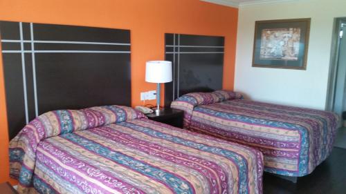 Cama o camas de una habitación en Heart of Texas Motel