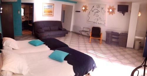 Ένα ή περισσότερα κρεβάτια σε δωμάτιο στο Chambre d'hôtes La Potinière
