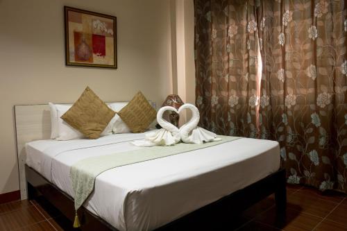 Posteľ alebo postele v izbe v ubytovaní Palmbeach Resort & Spa Mactan, Cebu