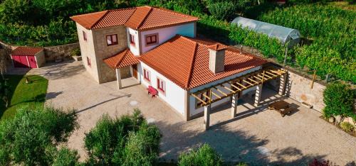 an overhead view of a house with a roof at Quinta dos Amores in Ponte de Lima