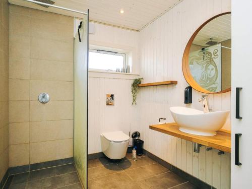 a bathroom with a sink and a toilet at 6 person holiday home in Grevinge-By Traum in Grevinge
