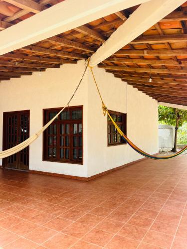 a room with a rope hanging from a building at Casa Ale in Brisas de Zicatela