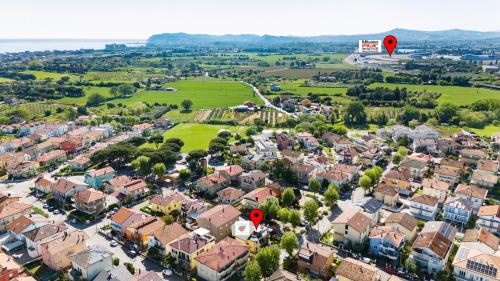 an aerial view of a residential suburb with red pointers at Le Rose Suites - Misano World Circuit & Beach in Misano Adriatico