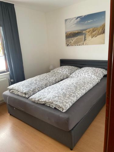 a bed in a bedroom with at Bungalow Orketal Sauerland in Medebach