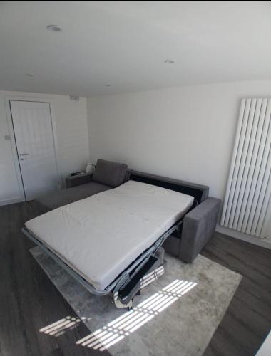 a large bed in a room with a mattress at Moodyscroft Homestay, NEC, BHX, Resorts world, HS2, JLR - Netflix in Birmingham