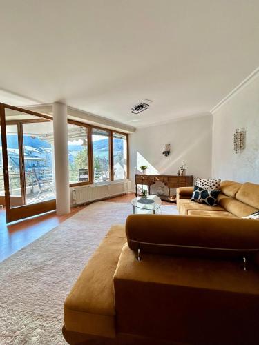 a large living room with a couch and a table at Molive in Traben-Trarbach