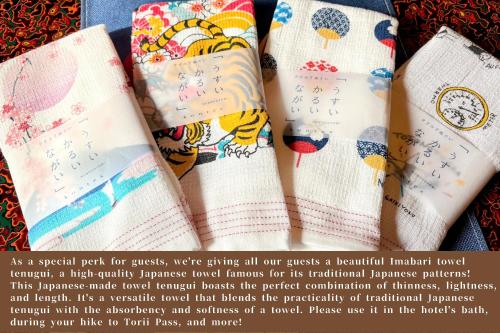 a pile of socks sitting on a table at Japanese Style Hotel WAKUWAKU-BASE Nakasendo Yabuharajuku