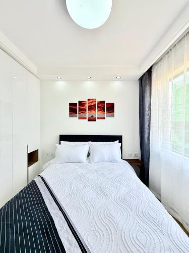 a bedroom with a large bed in a room at Araka Homes-Westlands in Nairobi