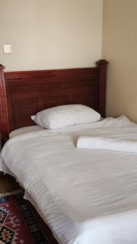 two beds sitting next to each other in a bedroom at Sky Nest 14 in Nairobi
