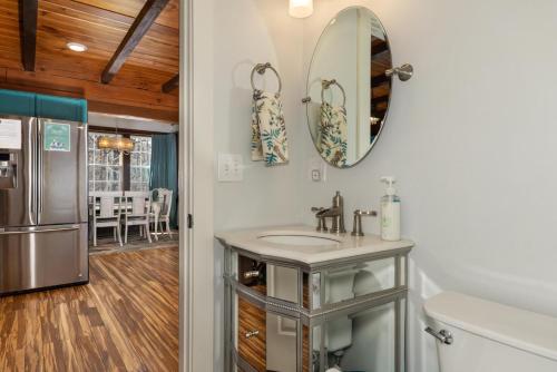 a bathroom with a sink and a mirror at Lakin' it Easy! - Powder Horn Mountain in Powderhorn Mountain