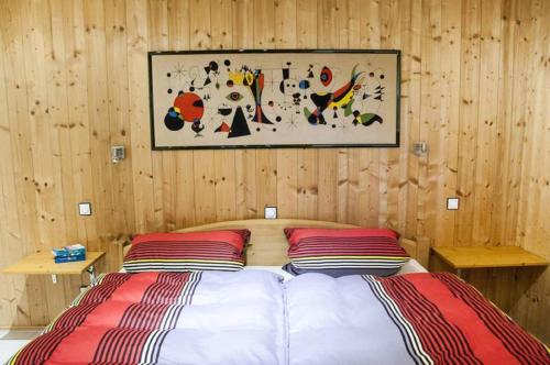Llit o llits en una habitació de Haus "Am Mühlheimer Berg"