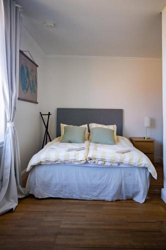 Ένα ή περισσότερα κρεβάτια σε δωμάτιο στο Captivating Harbor View Suite