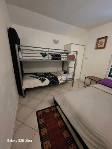 Postel nebo postele na pokoji v ubytování PR2e 2Rooms