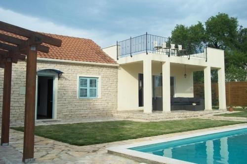 Family friendly house with a swimming pool Zadar - 25391