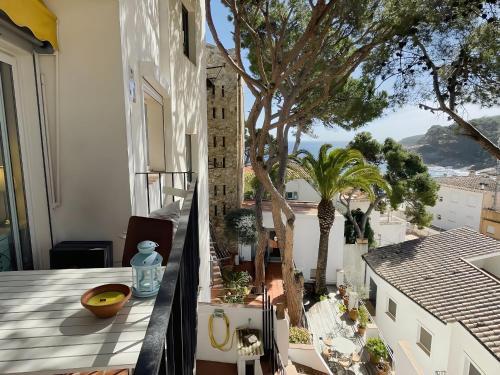 a balcony with a view of a building at Stunning Intimate views. Terrace Rooftop. Wifi in Tamariu