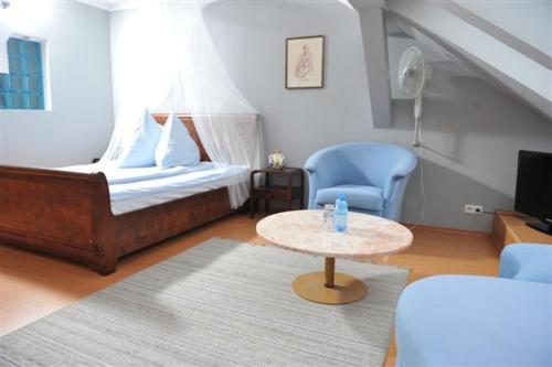 Кровать или кровати в номере Zamek Dobra