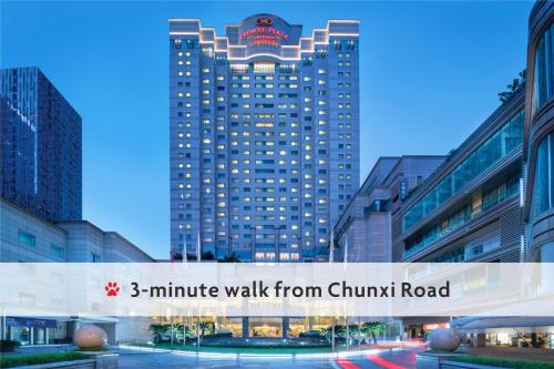 a large building with the words minute walk from chunk road at Crowne Plaza Chengdu City Center by IHG in Chengdu