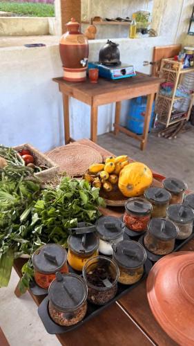 a table topped with lots of different types of food at Ovis kitchen in Matara