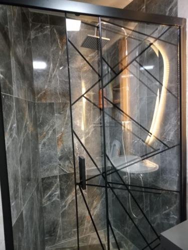 a glass door with a sign on it at Ankara Esenboğa Airport Comfort Apart in Ankara