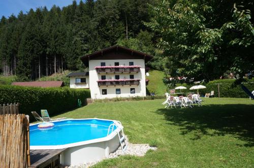 The swimming pool at or close to Haus Peter