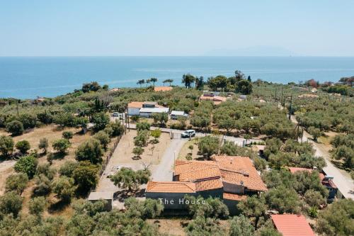 an aerial view of the house with the ocean in the background at Natural retreat in Makri
