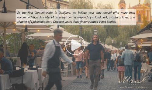 a group of people walking down a street at Hotel Mrak in Ljubljana
