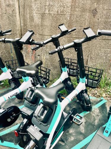 a row of bikes parked next to each other at 星宿川-竹の宿103 in Osaka