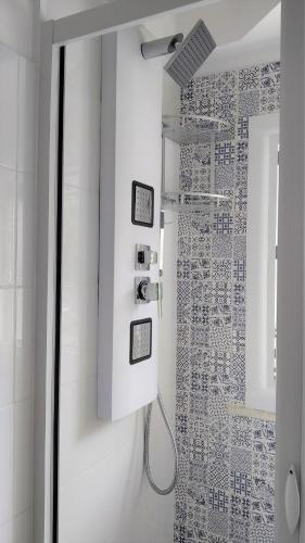a bathroom with a shower with a glass door at Relax e Mare a Bellaria in Bellaria-Igea Marina