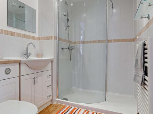 a bathroom with a shower and a sink at 2 Bed in Wellington oc-00467 in West Buckland