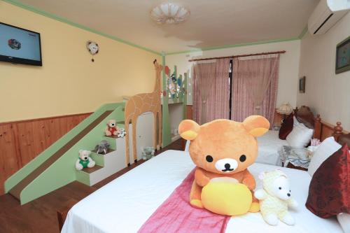 Yilan Homeland B&Bにあるベッド