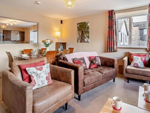 a living room with two chairs and a couch at 3 Bed in Brecon oc-bn304 in Brecon