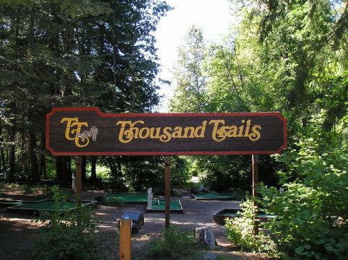 a sign for the town of flowers and falls at Leavenworth Camping Resort Lodge 1 in Leavenworth