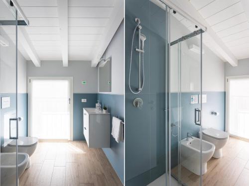 a bathroom with two toilets and a glass shower at Maison Bellini number 3 in Toscolano Maderno