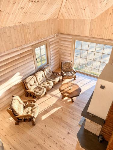 an overhead view of a living room in a log cabin at Liedaga 24 in Tūja