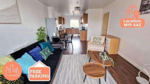 a living room with a couch and a dining room at Lovely 3 Bed Close to Centre by City SuperHost in Manchester