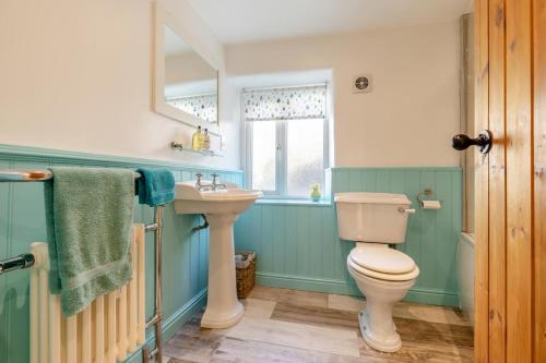 a bathroom with a toilet and a sink at 3 Bed in Tideswell oc-w39004 in Tideswell