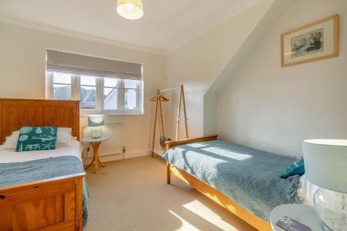 a bedroom with a bed and a window at 2 Bed in Reydon oc-s39034 in Reydon