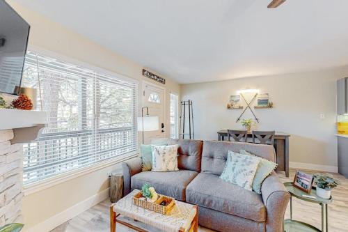 a living room with a couch and a fireplace at Tranquil condo in Stateline sleeps 4 in Stateline