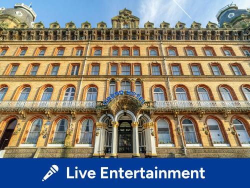 a large building with the words live entertainment at The Grand Scarborough in Scarborough