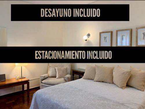 a bedroom with a bed and a sign that reads esacionima mexico at Hotel Villa Inés Mendoza in Mendoza