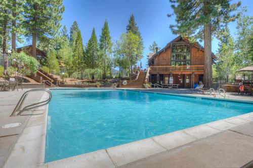 a large swimming pool in front of a house at Idyllic Incline Village Getaway in Incline Village