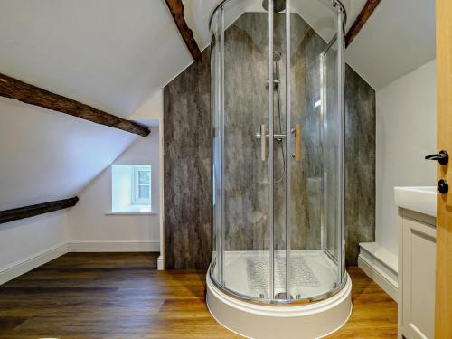 a shower in a room with a ceiling at 3 Bed in Brecon oc-93680 in Llandefalle