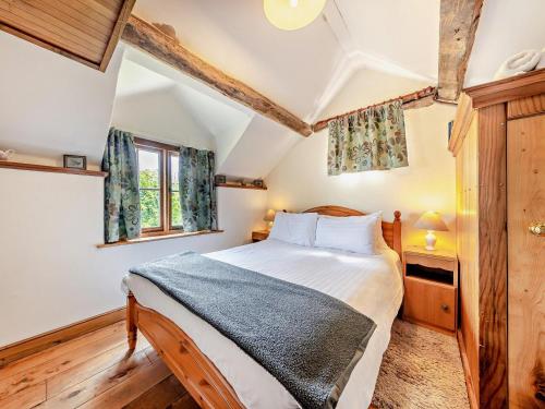 a bedroom with a bed and a window at 2 Bed in Craven Arms oc-95107 in Kerry