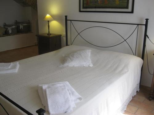 Ein Bett oder Betten in einem Zimmer der Unterkunft Nel cuore di Spello